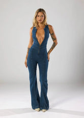 Duttini | Fitted Denim Jumpsuit With Plunge Neck And Flared Legs